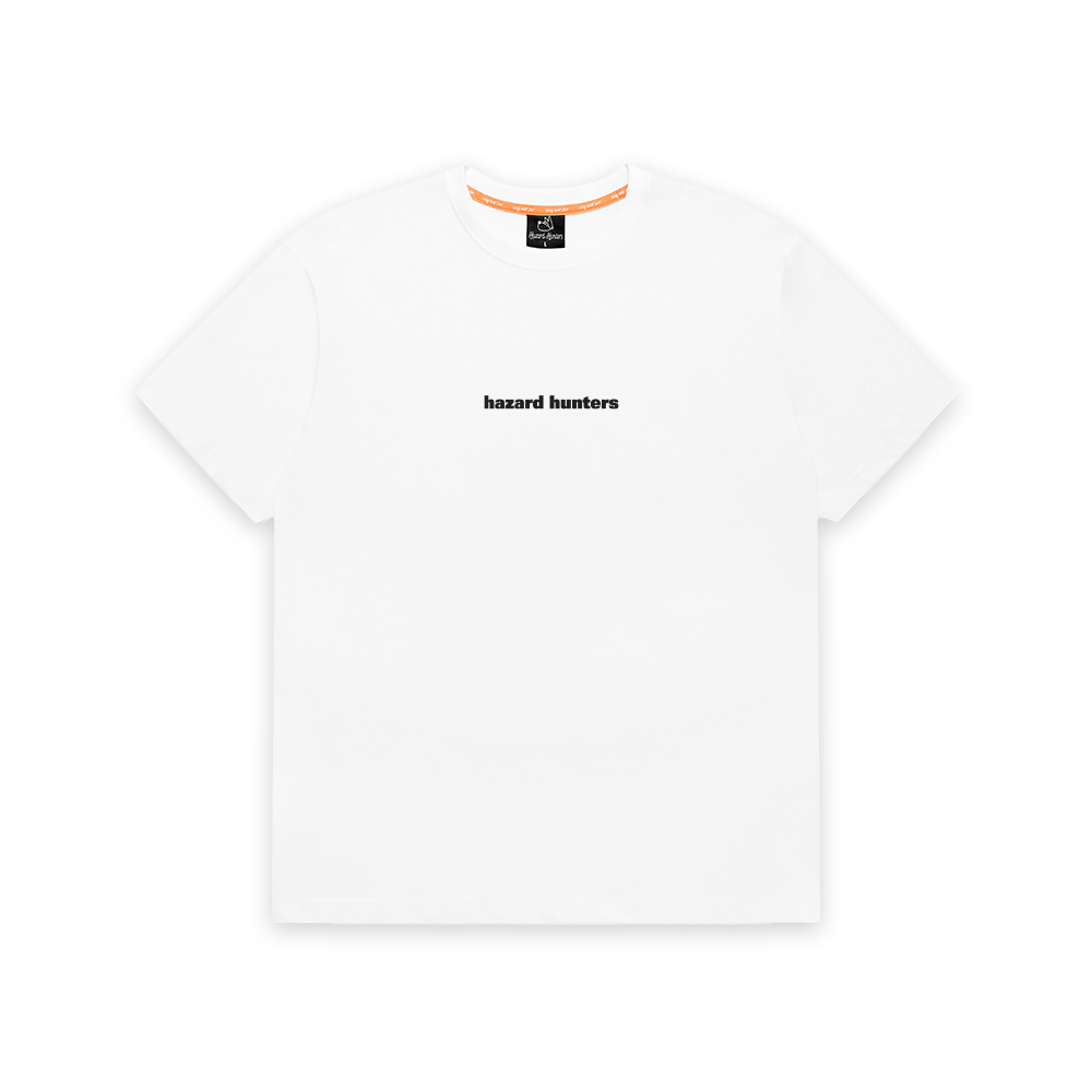 A white crew neck t-shirt with 'Hazard Hunters' text on the chest, designed with an asymmetrical back seam.