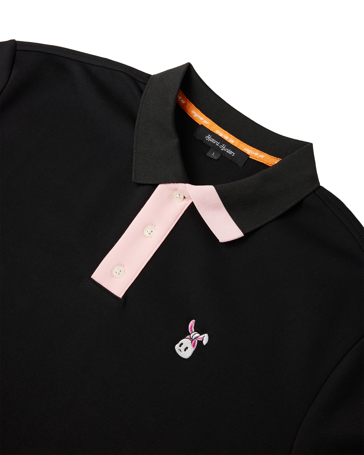 A black polo shirt with a white and pink embroidered bunkie emblem on the chest,  pink contrast on the button placket and collar, and a relaxed fit.