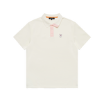 A cream polo shirt with a white and pink embroidered bunkie emblem on the chest, pink contrast on the button placket and collar, and a relaxed fit.