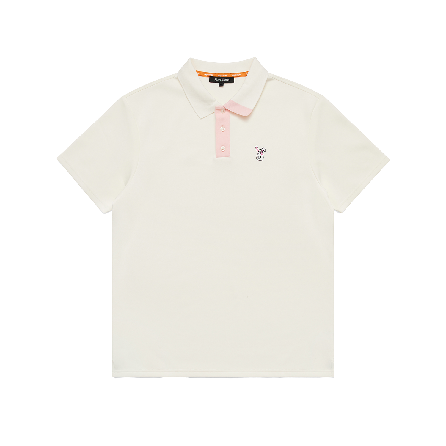 A cream polo shirt with a white and pink embroidered bunkie emblem on the chest, pink contrast on the button placket and collar, and a relaxed fit.