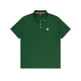 Green polo shirt with a small logo on a white background